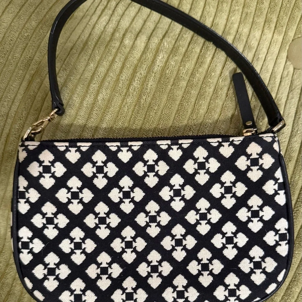 Kate Spade Black and White Linet Wristlet with Pink Accent